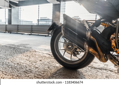 Close up of motorcycle wheel burnout at parking.
