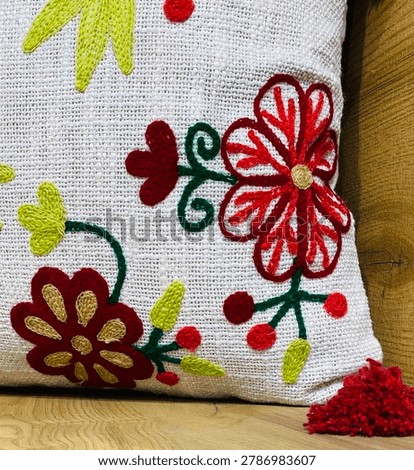 Close up multi Bed and sofa Decorative Embroidery Weave Cushion Cover with filler, Hotel room interior, bed and pillows, Decorative pillows with a floral pattern of a rustic design. Embroidered cushion with filler.