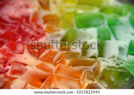 A close up of multi-colored Jello