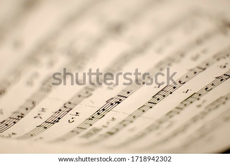 close up of a musical pentagram on a music sheet

