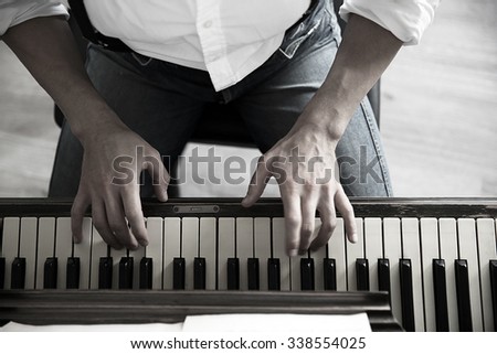 Close up of musician hands classic piano playing