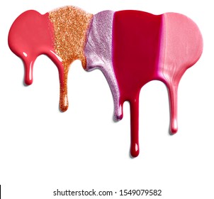 close up of  a nail polish  or paint drops leaking on white background