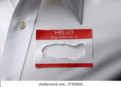 Close Up Of Name Tag On Shirt With Name Torn Out