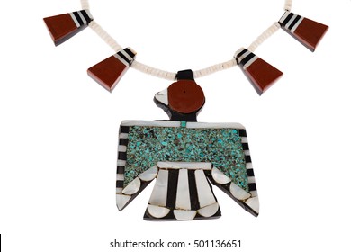 Close Up Of Native American Jewelry, Santo Domingo Turquoise And Coral Thunderbird And Tag Necklace Isolated On White.