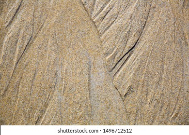 Close up of natural sand surface at the beach after low tide, nobody