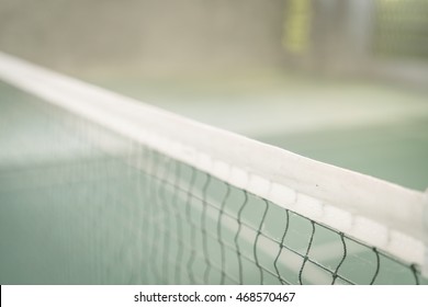 Close up of net in badminton court ( Filtered image processed vintage effect. )