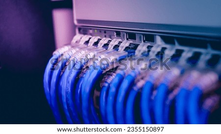 Close up Network gigabit switch and UTP port cat6 ethernet cable in data server room