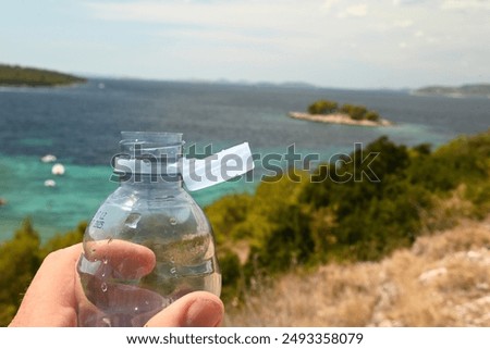 Close up of new cap attached to plastic bottle
