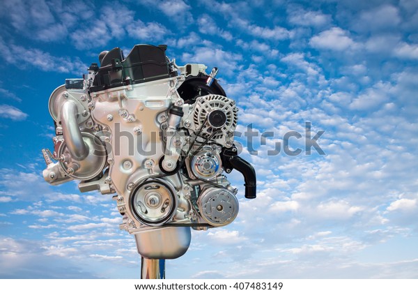 Close up  new engine car on sky\
background with clipping path,concept engine for\
environment