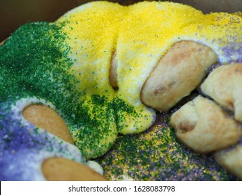 Close Up of New Orleans King Cake with Foreground and Background Intentionally Out of Focus