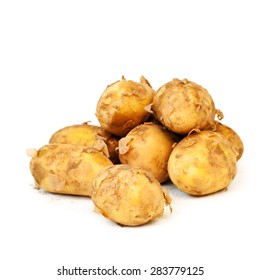 Close Up Of New Potatoes, Isolated On A White Background