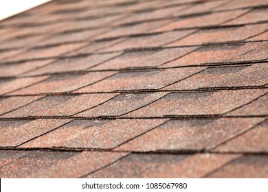 Close Up Of New Roof With Asphalt Shingles