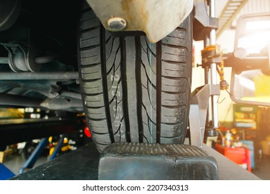 Close Up Of A New Tire Tread Of A Car In A Auto Tire Shop, Automobile Maintenance Service Business Concept