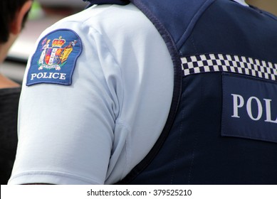 Close Up Of A New Zealand Police Officer's Uniform And Badge