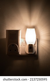 Close Up Of A Night Light Plugged Into A Wall In A House