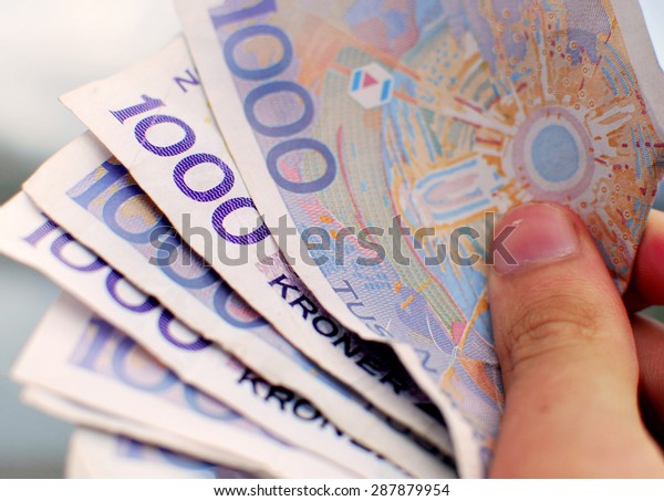 Close Up Of Norwegian\
Bank Notes - Money Norwegian thousand kroner bills/notes. The 1000\
kr bank note is the largest amount of money to be found on paper in\
Norway.