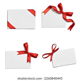 close up of a  note card with ribbon bow on white background - Powered by Shutterstock