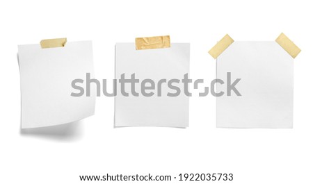 close up of  a note paper with adhesive tape on white background