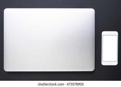 Close notebook and blank screen mobile phone