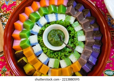 Close Up Of Nyonya Kuih (malay Cakes) Arranged In A Beautiful Circle On A Decorative Plate. Kuih Are Bite-sized Dessert That Are Colourful And Popular In South East Asia Culture