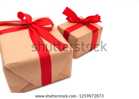 close up objects Brown Gift box bow tie Red ribbon isolated on white background merry christmas and happy  new year concept