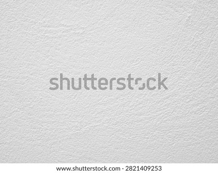 Close up of off white roughcast plaster wall with natural architectural texture