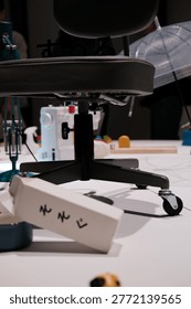 Close up of an office chair and everyday objects labeled with Japanese hiragana at Design Ah neo