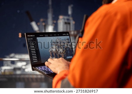 Close up of offshore platform technicians checking equipment status indicators on laptop system dashboard. Workers verifying hydraulic pressure levels on notebook digital monitoring panel