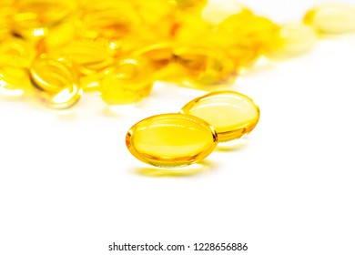 Close up of oil filled capsule (soft gel) suitable for presenting food supplements: fish oil, omega 3, omega 6, omega 9, vitamin A, vitamin D, vitamin D3, vitamin E, evening primrose oil, borage oil.