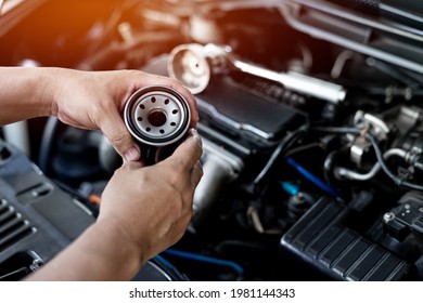 Close Up Oil Filter Of Car And Wrench On Engine A Man Change In Engine Room Service Concept Of Car