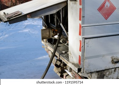 Close Up Of Oil Tank Truck Delivering Heating Oil.