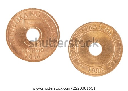 Close up of the old 5 Sentimo Philippines coin isolated on a white background