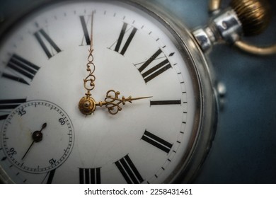 Close up old antique classic clock. Overlay effect on old paper texture. Concept of time, history, science, memory, information. Retro style. Vintage watch, clock background. - Powered by Shutterstock