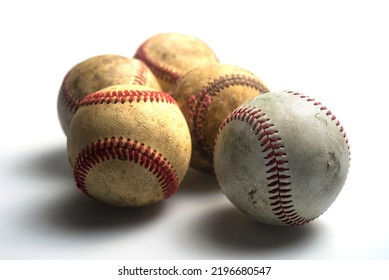 Close Up Old Baseball Isolated On A White Background.