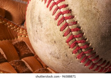 Close Up An Old Baseball In A Mitt.