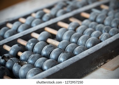 Close Up Of Old And Broken Chines Abacus Calculator