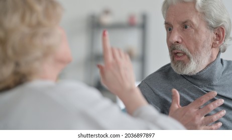 Close Up Of Old Couple Fighting, Arguing At Home