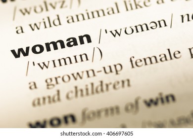 Close Up Of Old English Dictionary Page With Word Woman