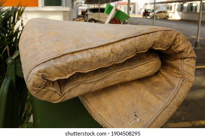 Close Up Of An Old, Forgotten And Abandoned Mattress At The Residential Garbage Dump