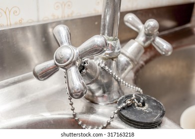 Close Up Of An Old Handle Kitchen Faucet