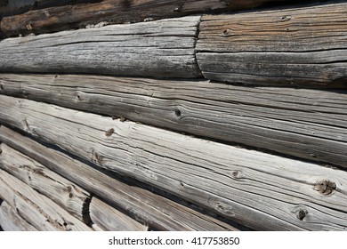 Close up of old logs. Side view