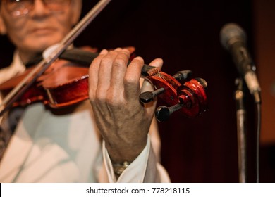 Close Up Old Man Playing Violin