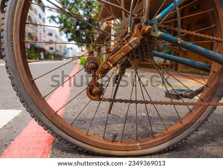 Close up of old part bicycle parked in Taiwan
