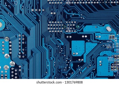 Close up of old printed blue computer circuit board