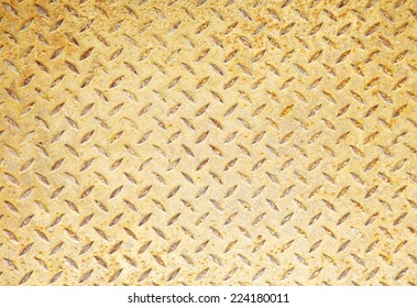 close up old red and yellow metal floor - Shutterstock ID 224180011