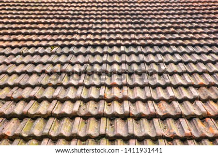 Close up of old rubber roof tiles