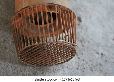 Close Up Old Rusty Pump Suction Filter. Rusty Suction Strainer.