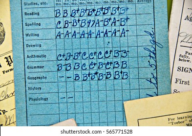 close up of old school report card