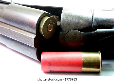 Close up of an old Shotgun and Shells