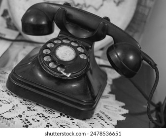 Close up of an old telephone, black and white photo - Powered by Shutterstock